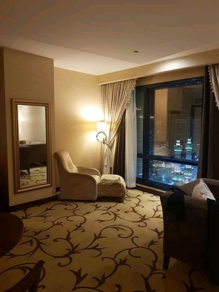 Hotel room with a night view overlooking the Haram